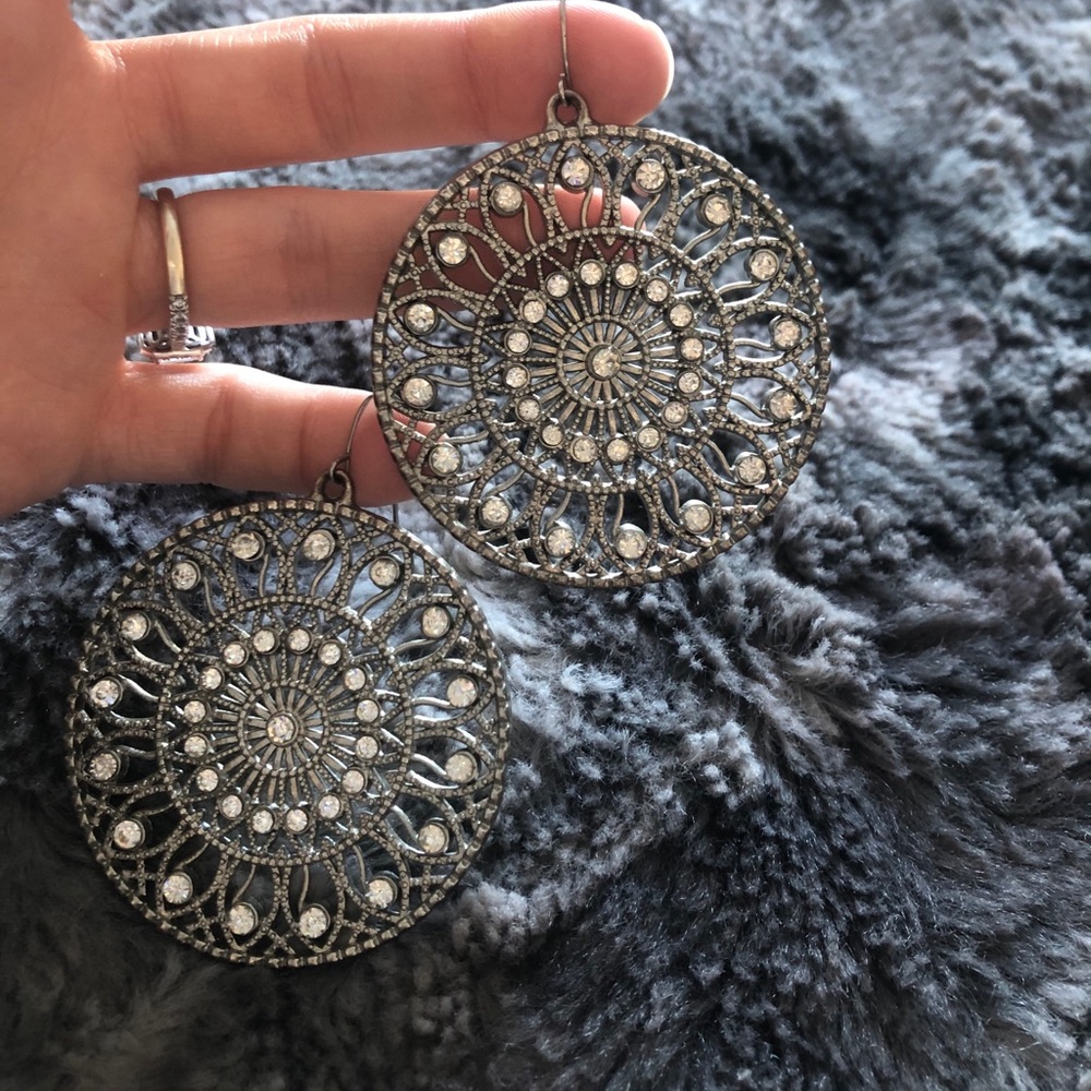 Round detailed silver dangle earrings